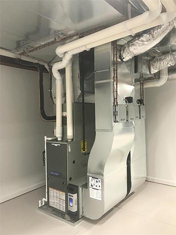 Back-To-Back Residential Heating and Cooling Systems